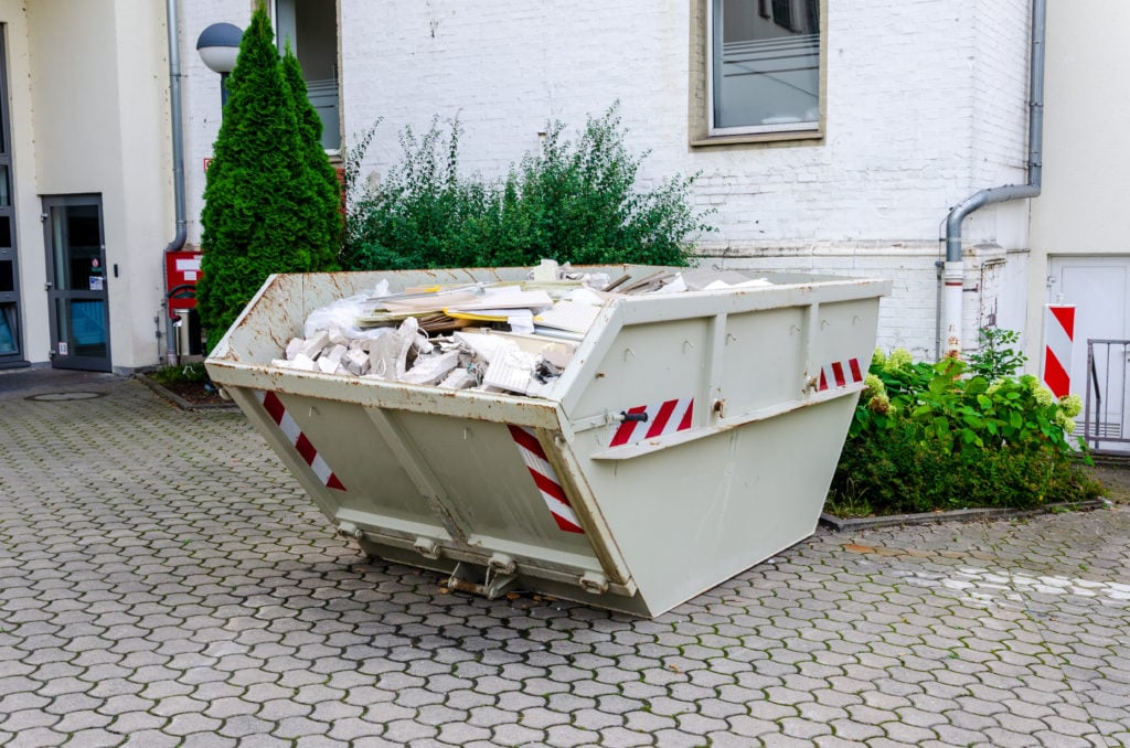 Construction waste container full of construction waste